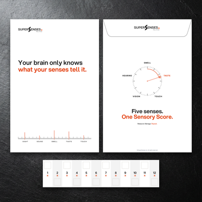 SuperSenses Five Senses Kit envelope front and back with numbered test cards on a slate background